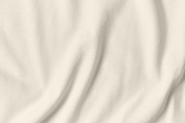 Textur und Hintergrund des zerknitterten weißen Stoffes.