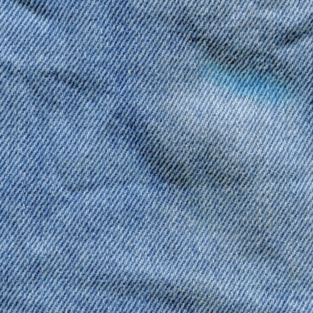 Textur von Blue Jeans Textil Leere hellblaue, natürliche, saubere Denim-Textur