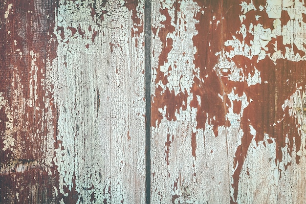 Textur von Holzbrettern mit abblätternder Farbe. Textur von alten Holzzaunbrettern. Holz Textur Hintergrund