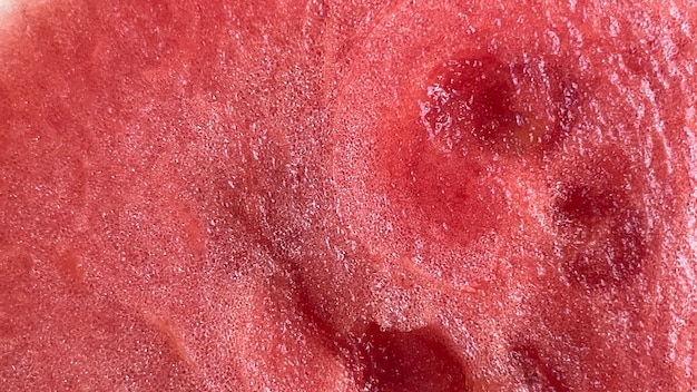Textur von Wassermelonenpulpe hautnah Sommerstimmung Hintergrund