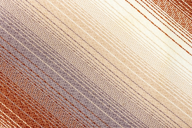 Textura abstracta de tela de algodón con líneas diagonales de colores. Fondo de tela natural