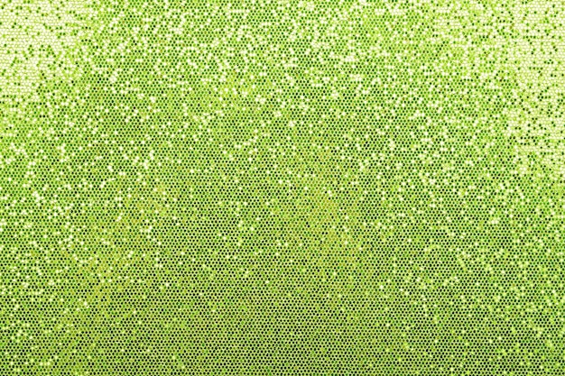 Textura abstrata de fundo de padrão de brilho verde brilhante com gradiente de luz