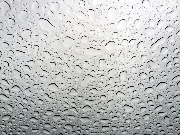 Foto textura abstrata de gotas de água em um copo