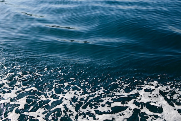 Foto textura de agua y espuma de mar.