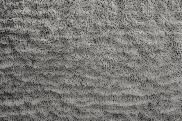 Textura de una alfombra gris.