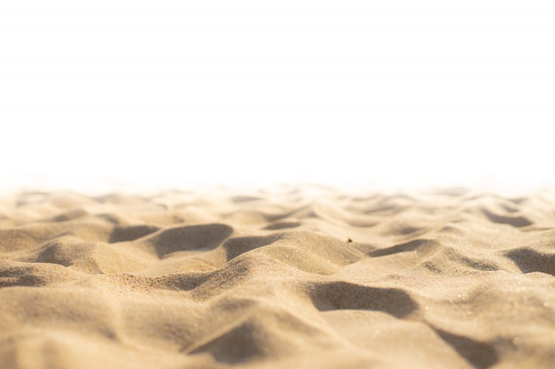 Foto textura de arena en la playa como fondo