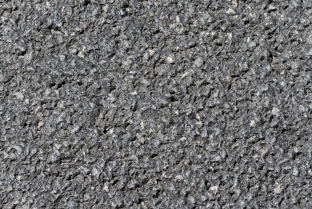Textura áspera de estrada de asfalto escuro