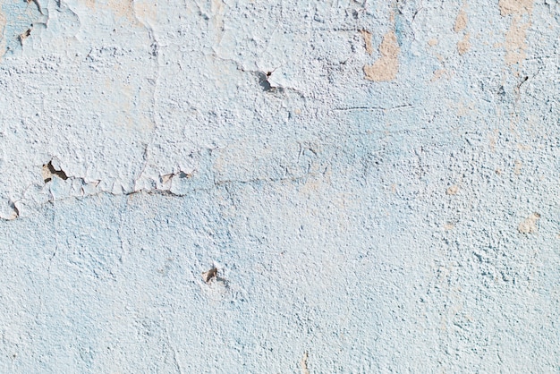 Textura azul con arañazos y grietas. fondo azul. patrón azul y blanco