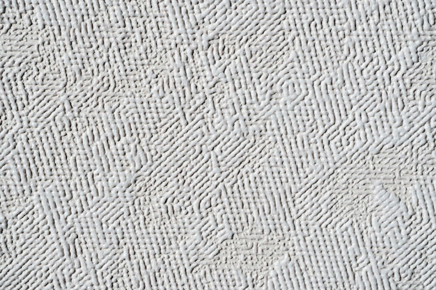 Textura beige un trozo de tela granulada como fondo