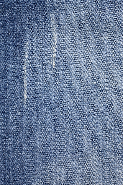 Textura Blue jeans rasgados fondo de mezclilla.