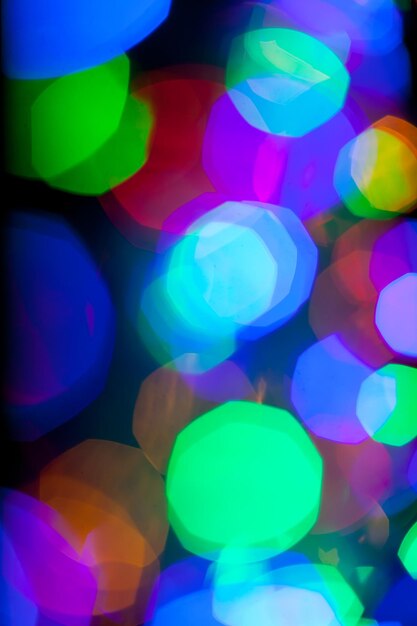 Textura bokeh de luces multicolores de navidad y año nuevo