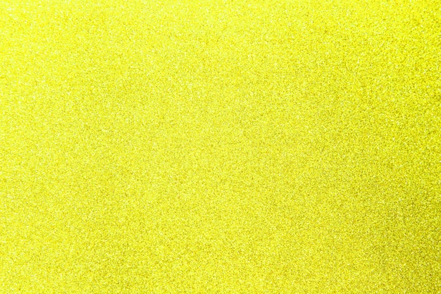 Textura brilhante do brilho amarelo para o natal, conceito da celebração.