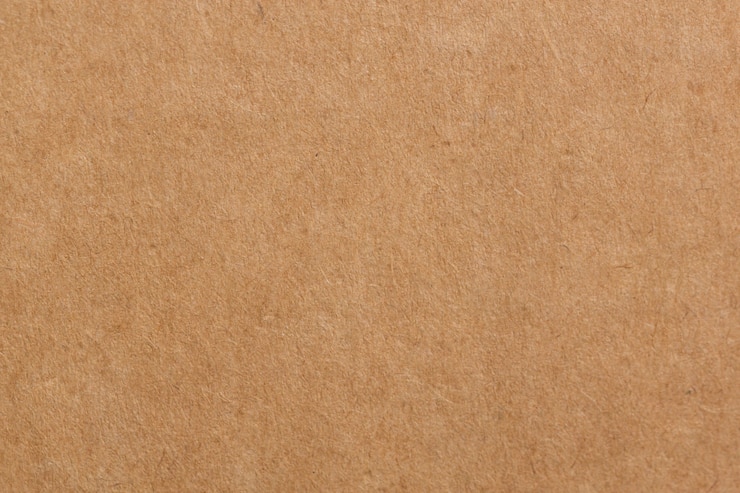 Foto textura de caja de papel de tablero marrón