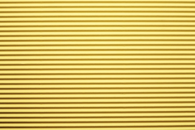 Textura de cartón amarillo. Fondo abstracto