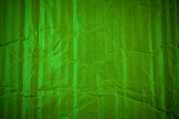 Textura de cartón verde arrugado.