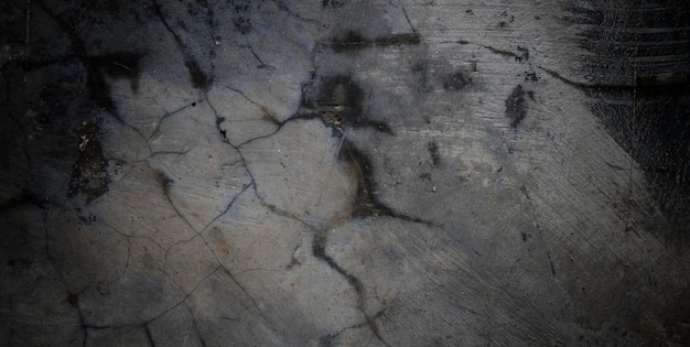 Textura de cemento llena de arañazos fondo de pared de hormigón oscuro aterrador