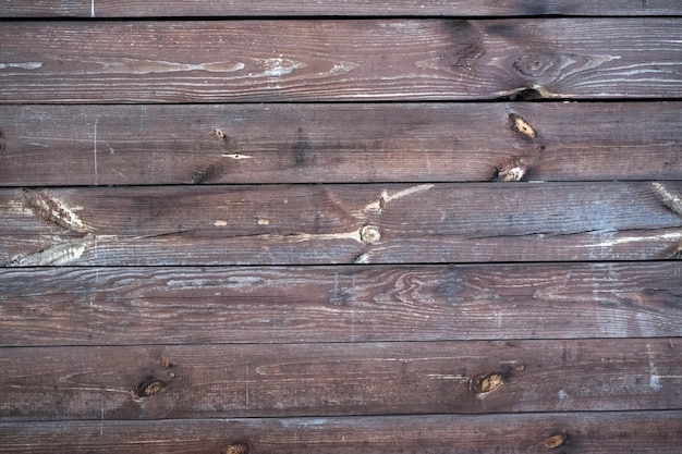 Textura de la cerca de madera, fondo de marco de troncos horizontales