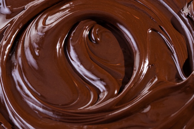 Textura de chocolate Primer plano de chocolate líquido Chocolate negro texturizado