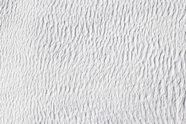 Textura cinzenta do fundo abstrato do travertino de cálcio de Pamukkale, na Turquia