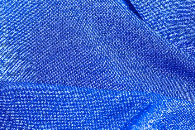 Textura de color azul brillante tejido lurex brillante