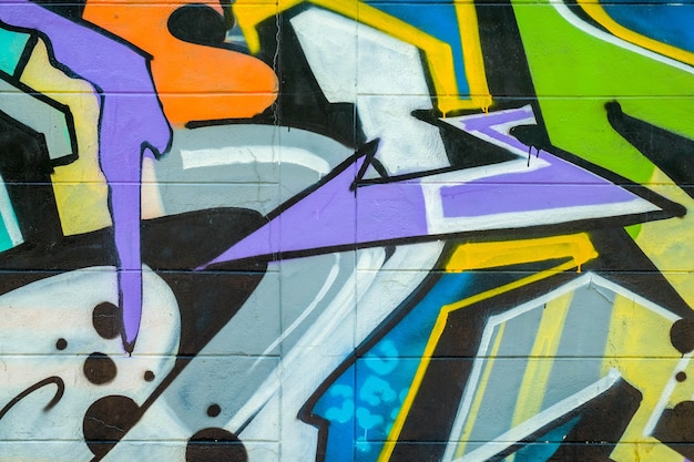 Foto textura colorida de graffiti en la pared como fondo