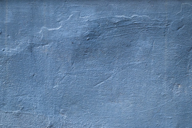 Textura concreta azul e cinza, fundo pintado áspero. cenário de arquitetura grunge. superfície sólida irregular.