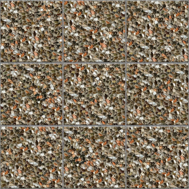 La textura sin costuras del pavimento exterior dañada por grava lavada