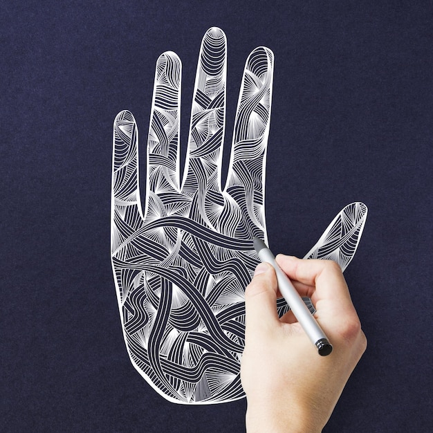 La textura creativa de la mano del mandala azul