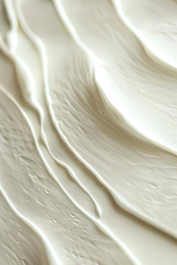 Foto textura cremosa suave con líneas onduladas y gotas