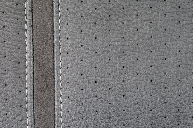 Textura de cuero gris con costura