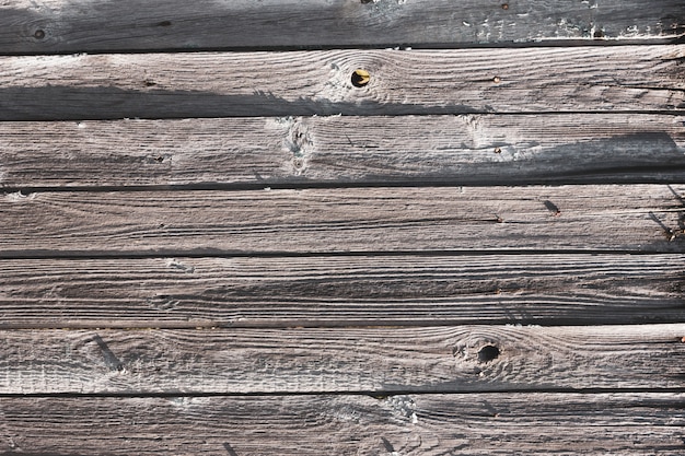 Textura da cerca velha. vila velha cerca closeup. Antigo fundo de madeira áspero