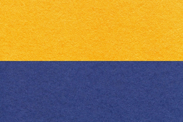 Textura da macro de fundo de papel amarelo e azul marinho Vintage dourado e papelão jeans