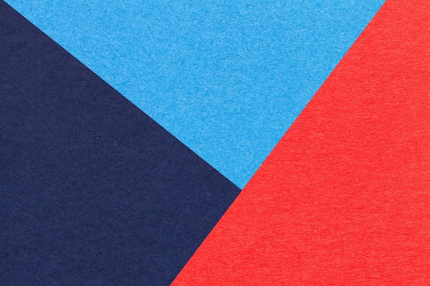 Textura da macro de fundo de papel de cor azul-marinho e vermelha para artesanato Estrutura de papelão de céu abstrato vintage