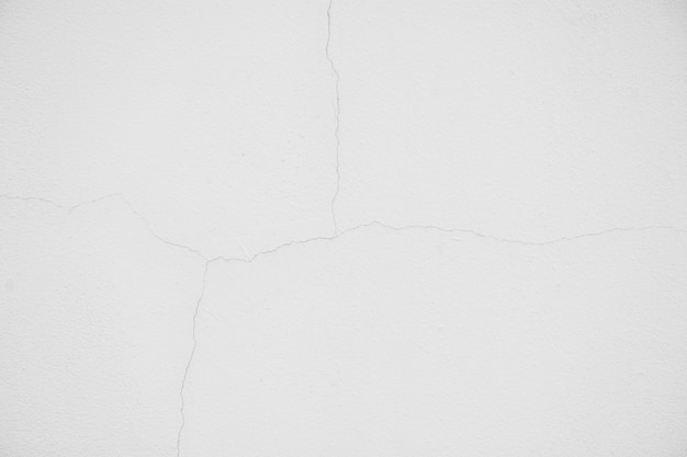 Textura da parede de cimento branco de crack - fundo