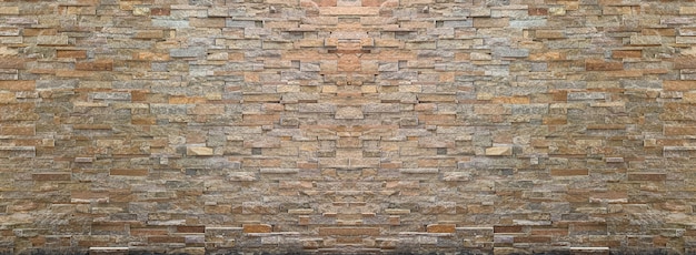 Textura da parede de tijolo para o fundo.