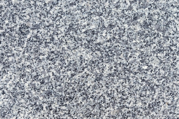 textura da pedra de granito é cinza preto Piso exterior e textura da estrada para muito cinza e azul