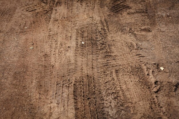 Foto textura da pista da roda em estradas rurais