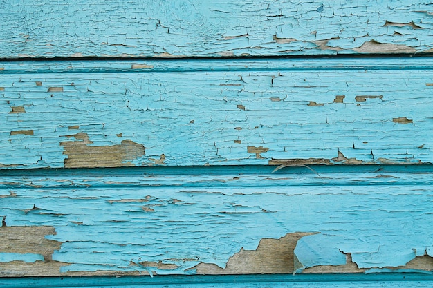 Textura da velha parede de madeira pintada da casa