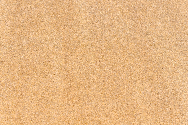 Textura de areia. areia marrom. vista do topo.