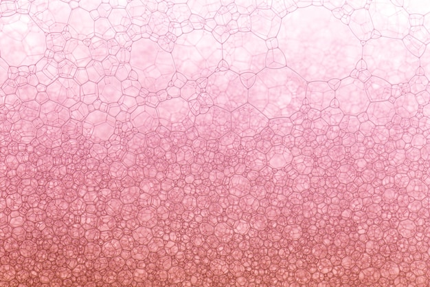 Foto textura de biotecnologia rosabolhas vermelhas abstratasmacro close-up de bolhas de sabão