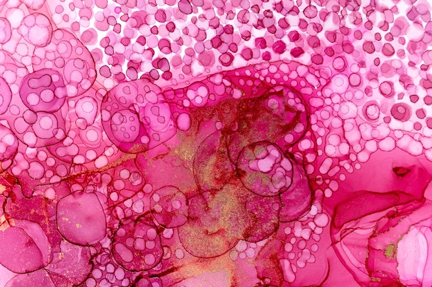 Textura de bolhas rosa em aquarela. Padrão de círculos aquarelle com pó de ouro.