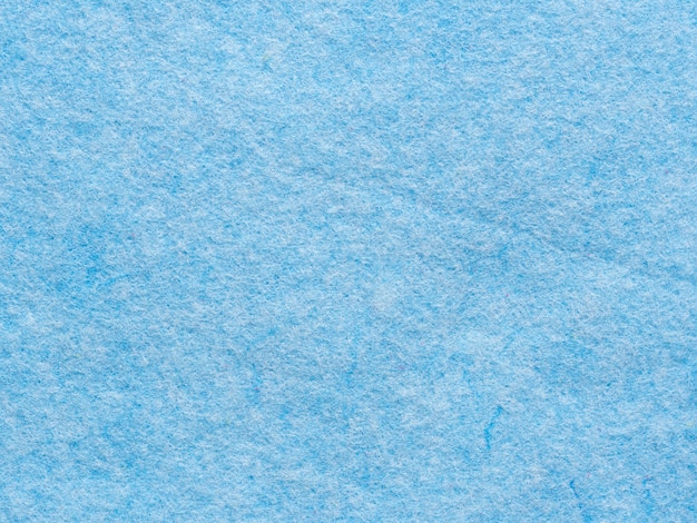 Textura de close-up de pano sintético azul para limpeza de casas