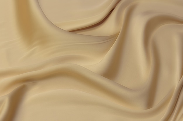 Foto textura de close-up de tecido bege natural ou pano na cor marrom. textura de tecido de algodão natural ou material têxtil de linho. fundo de tela bege.