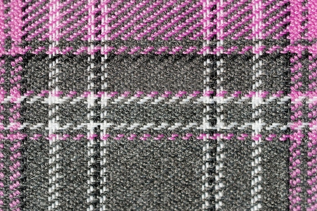 Textura de close-up de tecido tartan rosa e cinza Fundo para o seu projeto Vestuário e estilo tradicional escocês