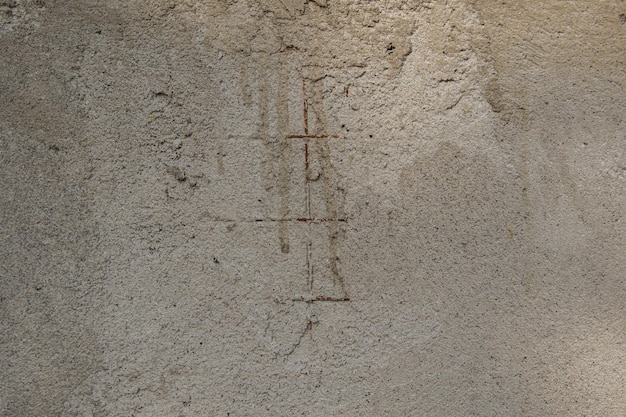 textura de concreto de perto, pequenas rachaduras na superfície do concreto, criam uma estrutura interessante