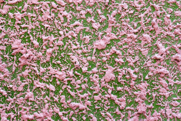 Textura de cor rosa na parede de concreto