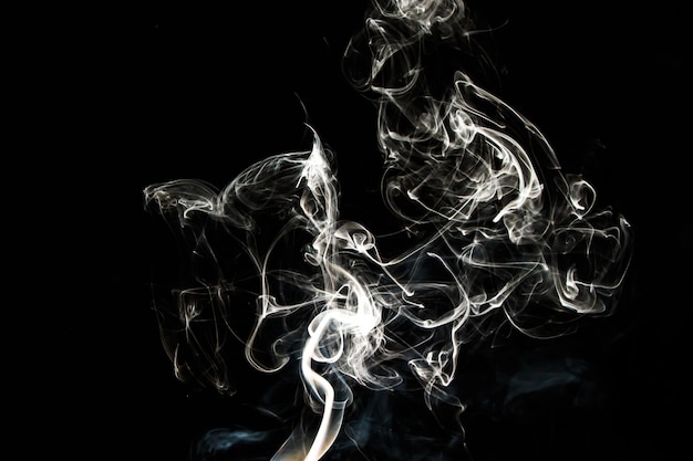Textura de efeito de fumaça Fundo isolado Contexto preto e escuro Fogo esfumaçado e efeito místico