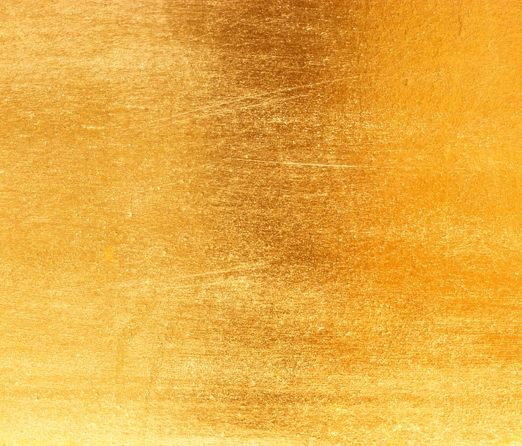 Foto textura de folha de ouro de folha amarela brilhante
