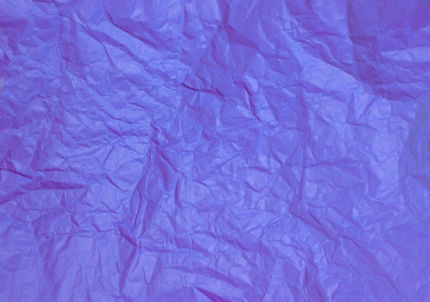 Textura de fundo abstrato de papel roxo amassado