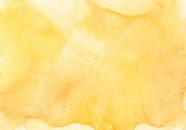 Textura de fundo amarelo vívido em aquarela. Pano de fundo amarelo dourado aquarela. Manchas no papel, pintadas à mão.
